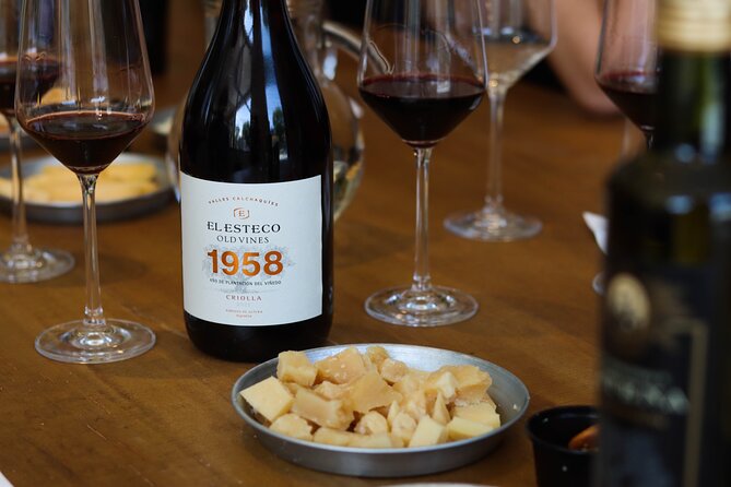 Argentine Wine Tasting in Caminito with Appetizers Included - Cheese, empanadas, and the meaning of small bites