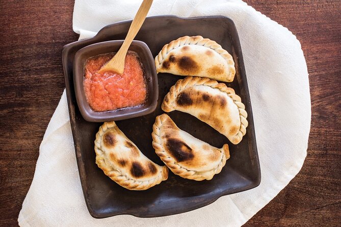 BA: Small-Group Empanadas Cooking Class in Palermo - Sitting down to eat what you made