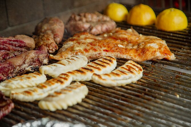 Buenos Aires Asado Experience with Wine Pairing - Learning the cuts beside the parrilla