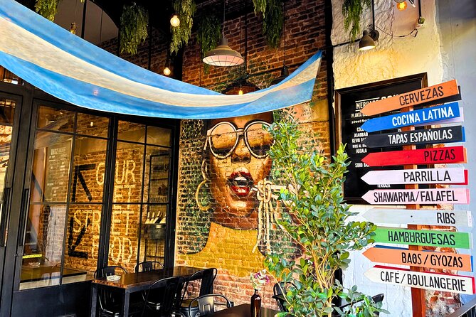 Buenos Aires Food Tour: Local Dishes, Steak, Empanada & More - Plaza Serrano, choripan, and the local grill