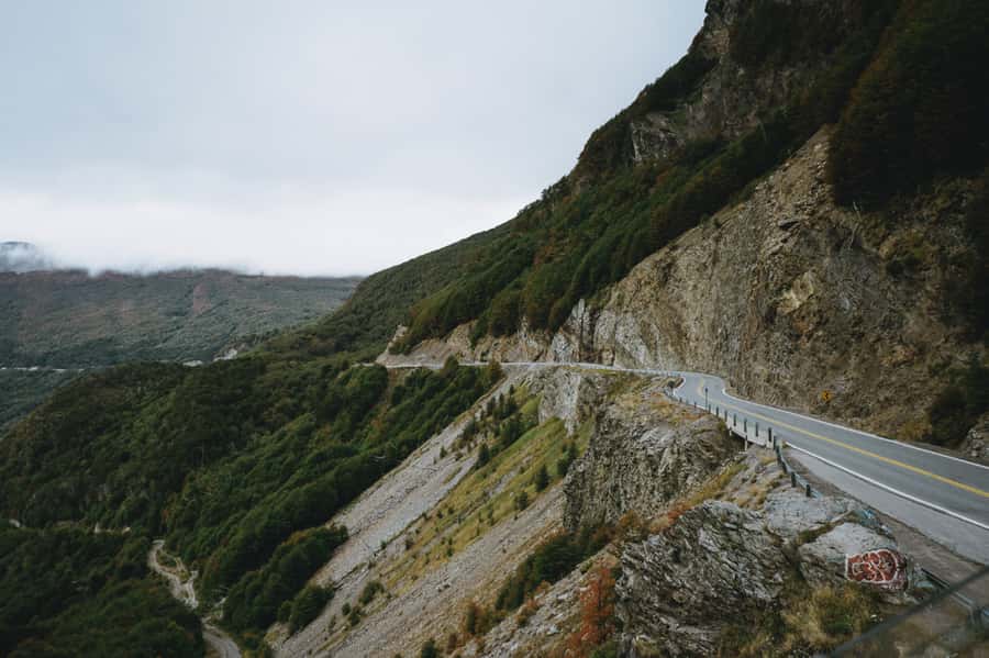 Crossing the Andes: Fagnano and Escondido lakes with lamb - Harwen Winter Center, gin, and old motorcycles