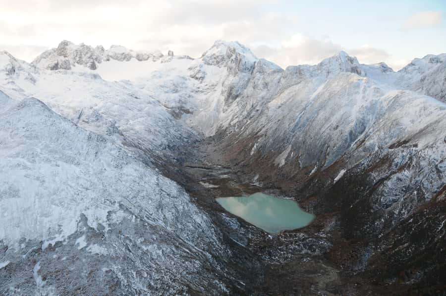 Emerald Lagoon Helicopter seeing - Flying over Ushuaia Bay and the Olivia River Valley