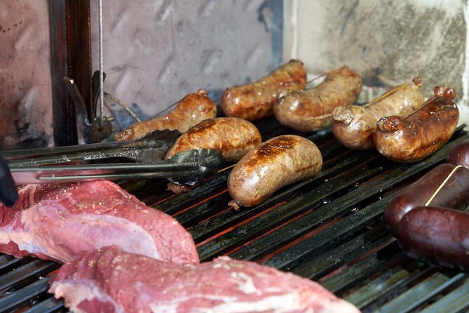 Join a Local Family Asado in Buenos Aires with Betty and Marcelo - Watching Marcelo work the fire