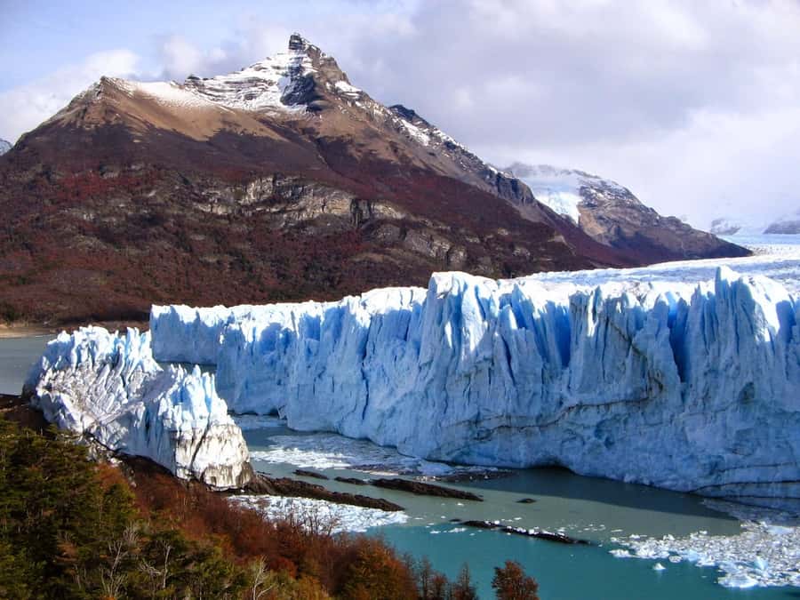 Los Glaciares National Park and Perito Moreno Glacier Tour - Watching an ice calving