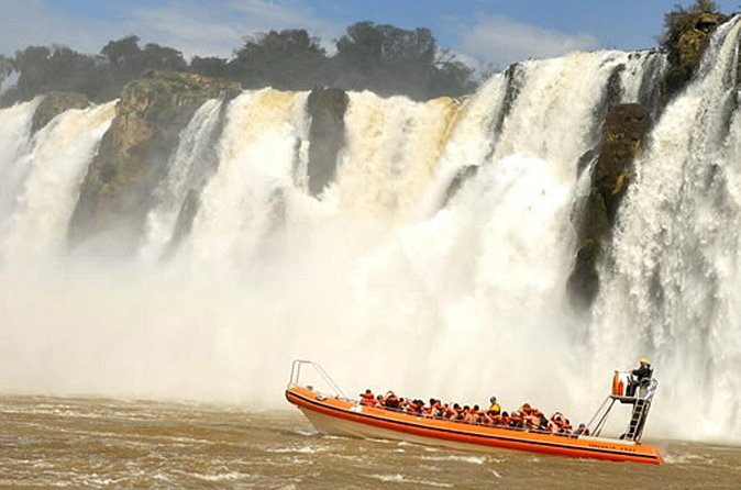 Motorboat under the waterfalls, 4x4 truck in the jungle with Argentine Falls - The Macuco Trail and Arrechea Waterfall