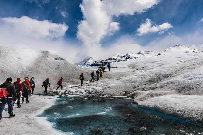 Perito Moreno Glacier Minitrekking Experience - Fitting crampons and crossing Perito Moreno Glacier