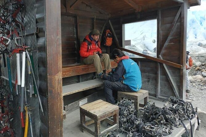 Perito Moreno Ice hike & walkways from El Calafate - Minitrekking - Putting on crampons for the 90-minute glacier walk