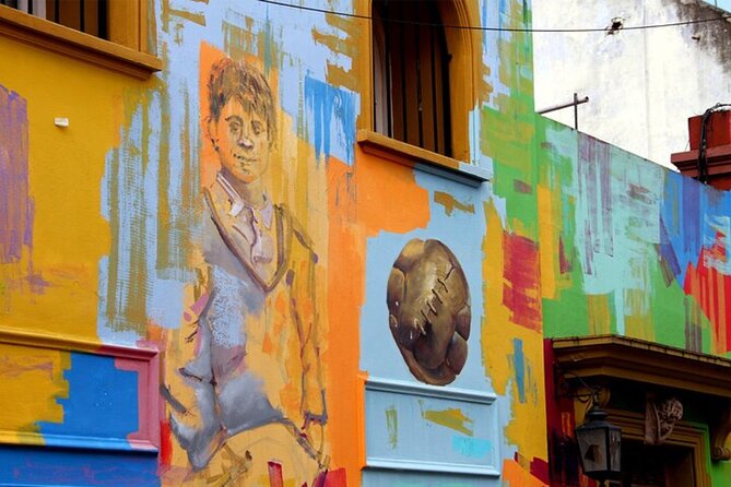 Premium Argentinian Wines and Malbec Tasting & Urban Art Tour - Pairing Malbec with a traditional picada