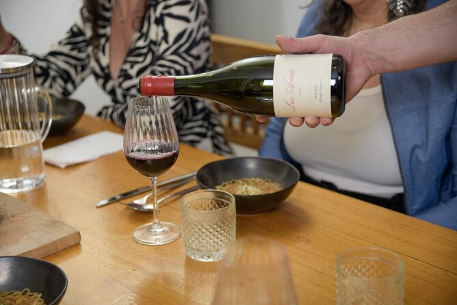 Private Argentinian Cooking and Wine Pairing in Downtown Mendoza - Wine pairing with white, red, and sparkling pours