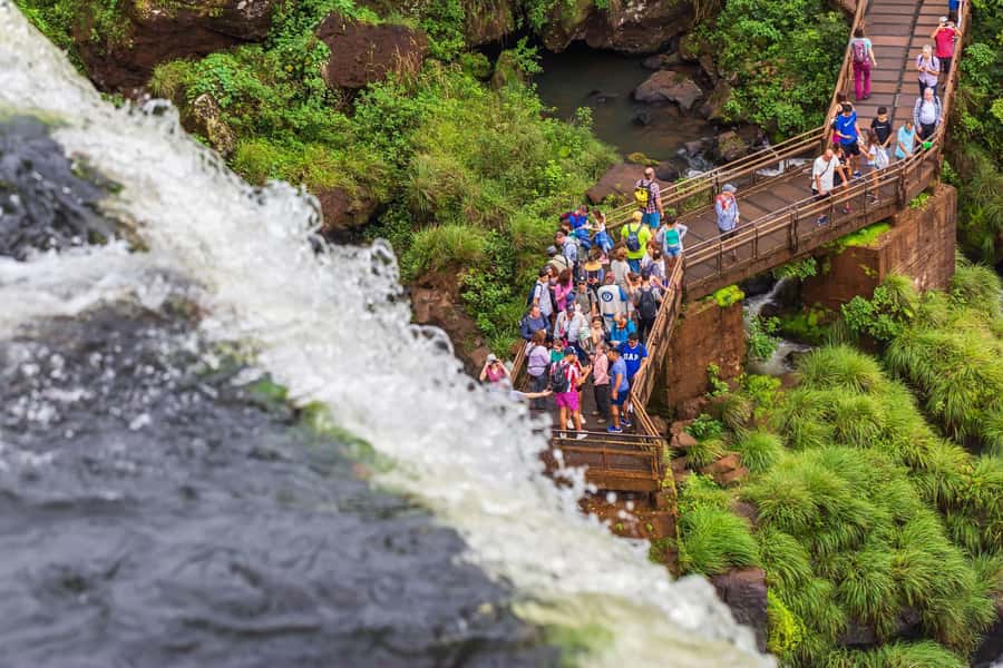 Puerto Iguazu: Iguazu Falls Boat Tour and Gran Aventura - Starting at the visitors’ center and taking the park train