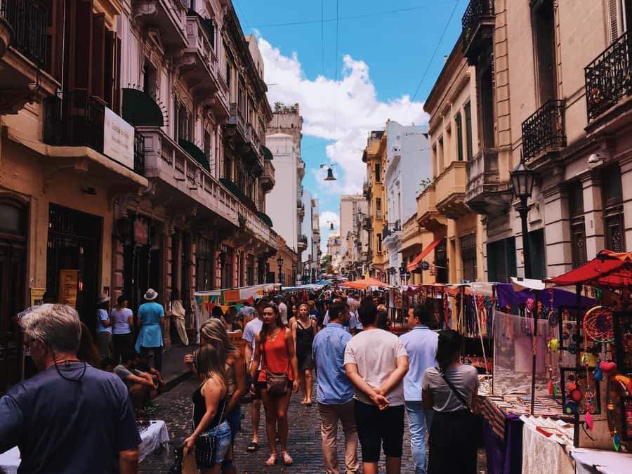 San Telmo: Historical Guided Tour with Street Food & Drinks - Walking through San Telmo Market