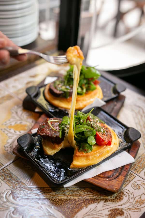San Telmo: Historical Guided Tour with Street Food & Drinks - Food stops that build from snacks to regional specialties